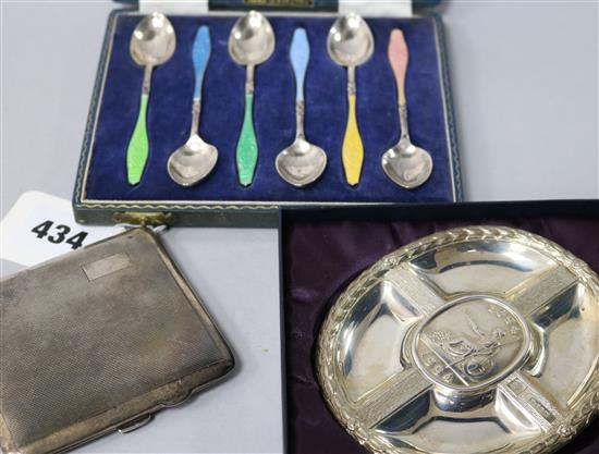 A cased set of six late 1950s silver and enamel coffee spoons, a commemorative dish and a cigarette case.